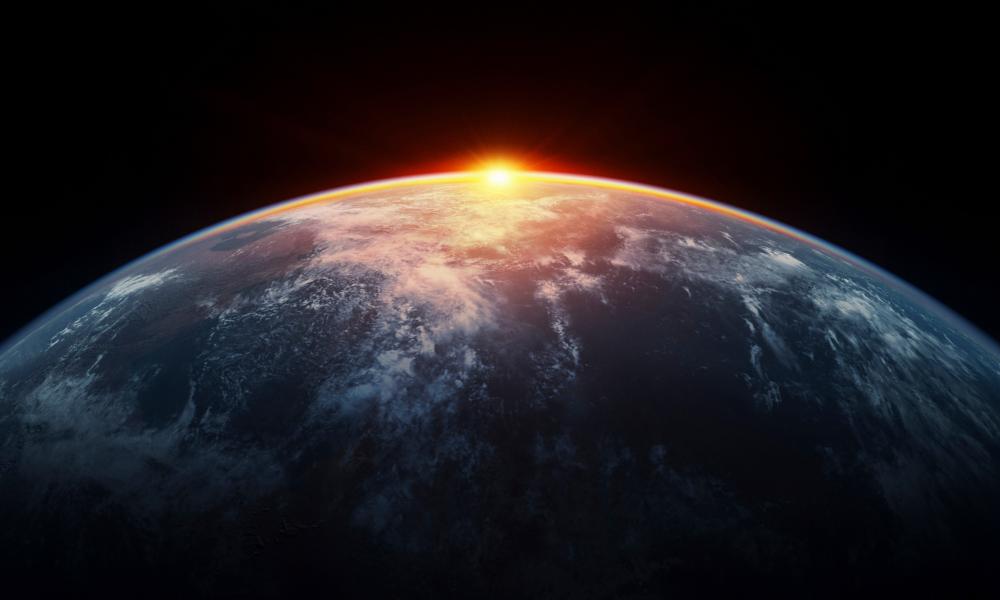 The sun rising over the planet earth from space Thumbnail