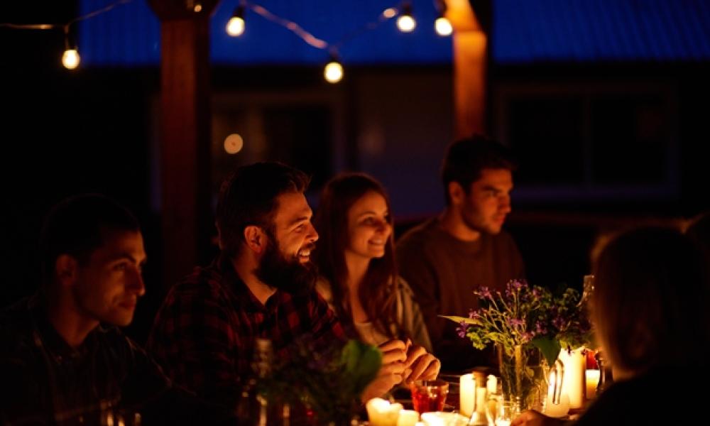 People hosting a dinner party