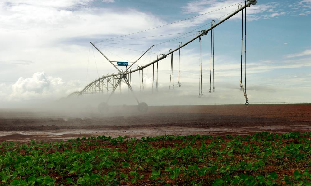 Giant water sprinklers from natural water supplies are remote controlled and the huge amounts of water is often taken at the local communities expense.