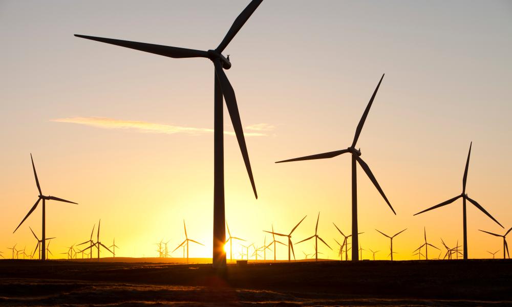 Dawn over Whitlee wind farm on Eaglesham Moor just south of Glasgow in Scotland, UK