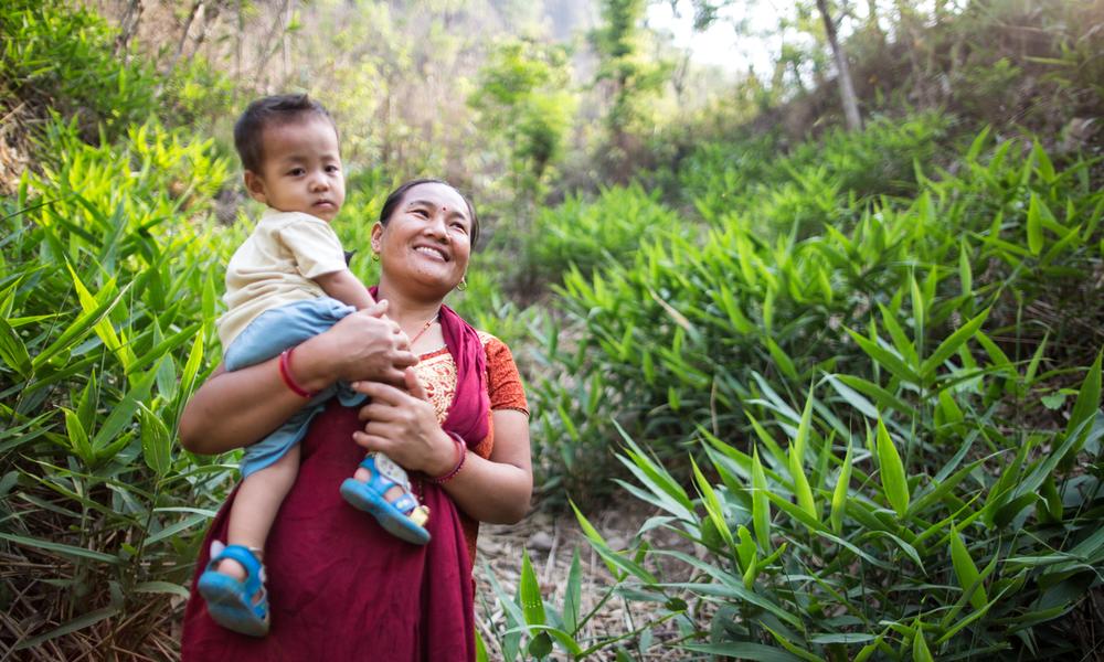 Portrait of Harigala Almathir and her son in the Abukhairani municipality ward n. 9, of Amdandabeshi, Nepal. 
