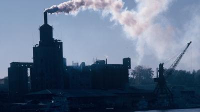 Heavy smoke from a polluting industry along the Amur River in Heihe city, China Heavy smoke from a polluting industry along the Amur River in Heihe city, China