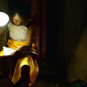 Girl with solar lamp