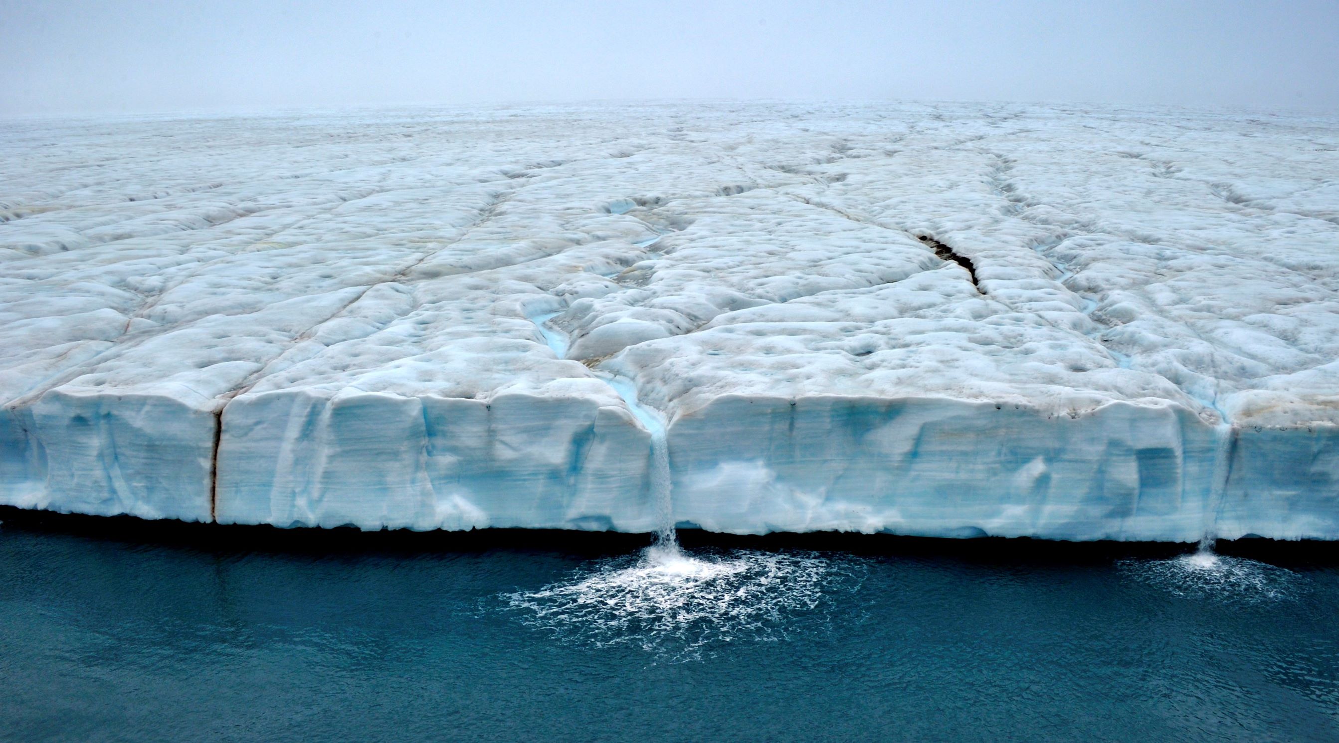 Waterfalls cascade from the Austfonna polar ice cap, Svalbard, Arctic. Andy Rousenna.jpg Waterfalls cascade from the Austfonna polar ice cap, Svalbard, Arctic. Andy Rousenna.jpg