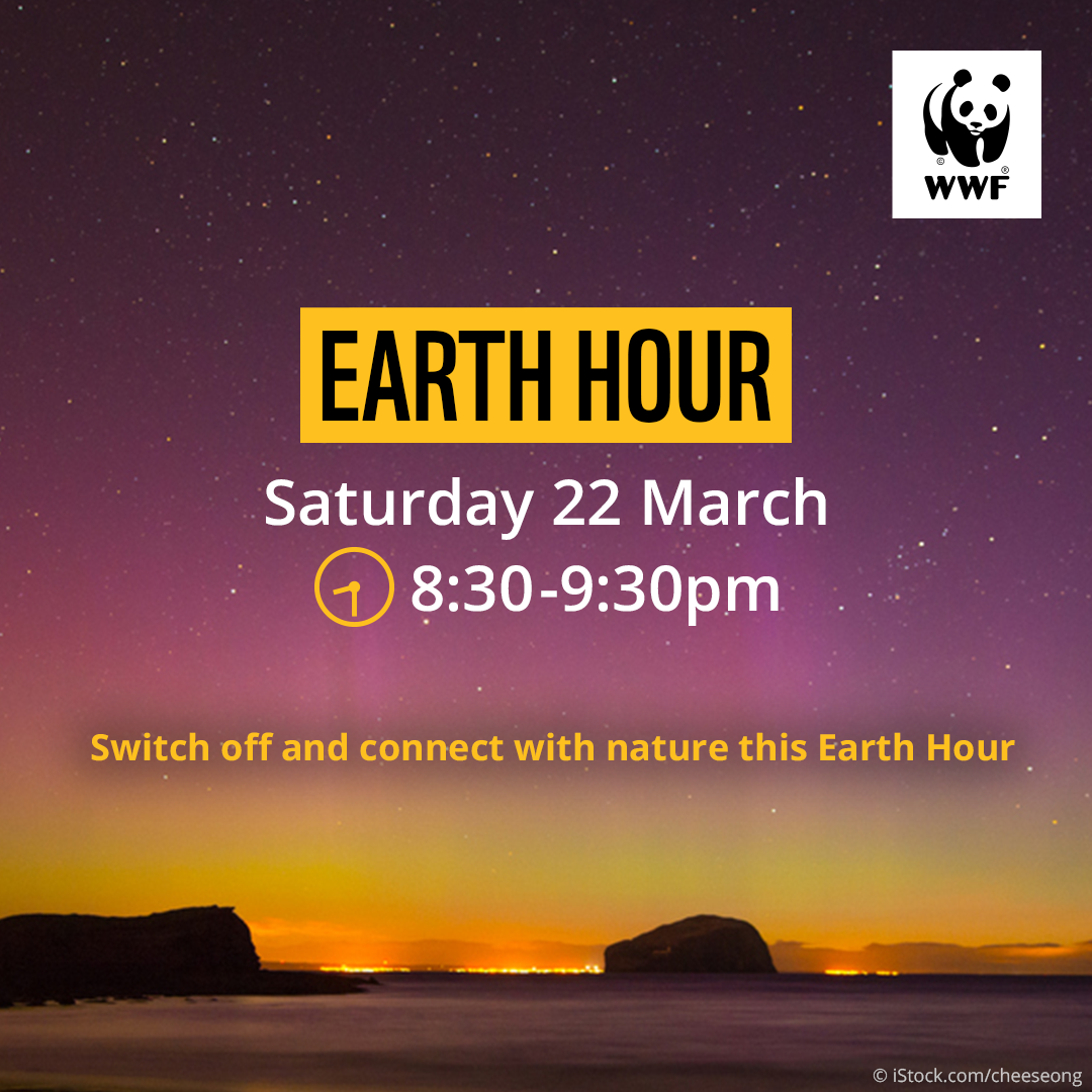 Sunset and the northern lights behind bass rock. Overlapping text reads, 'Earth Hour. Saturday 22 March. 8:30-9:30pm. Switch off and connect with nature this Earth Hour'