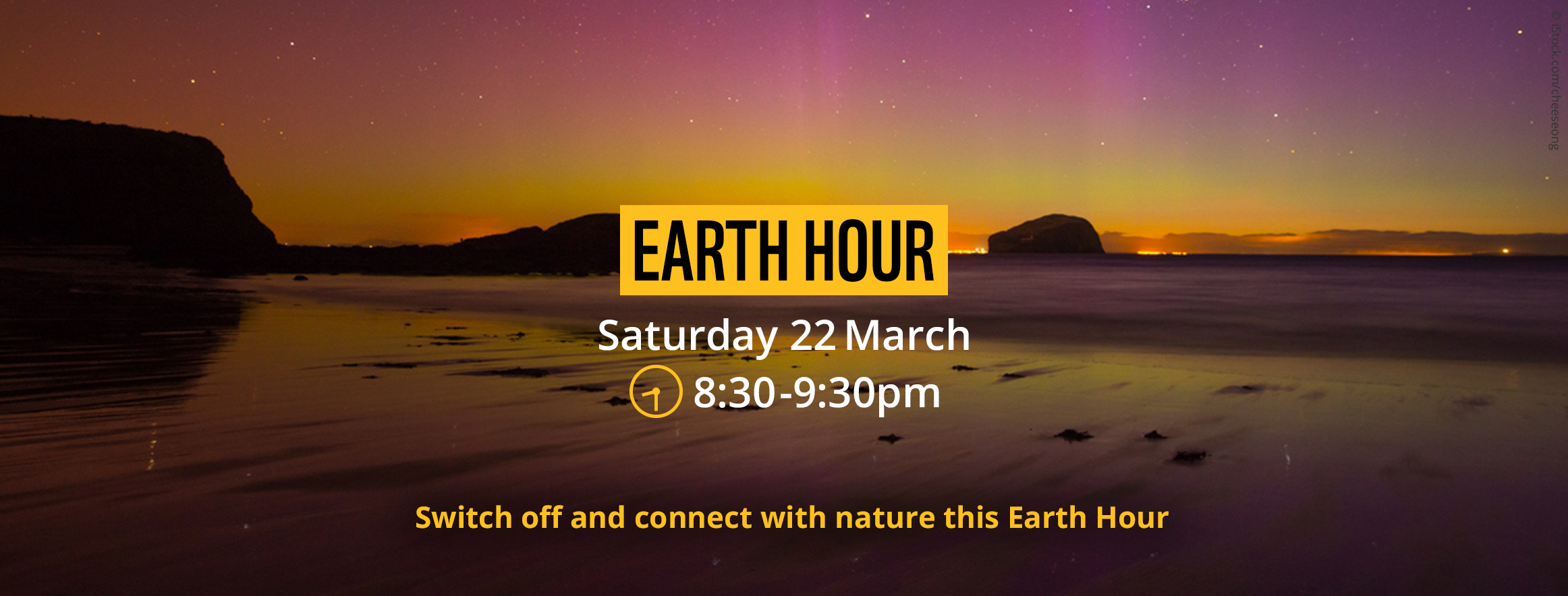 Sunset and the northern lights behind bass rock. Overlapping text reads, 'Earth Hour. Saturday 22 March. 8:30-9:30pm. Switch off and connect with nature this Earth Hour'