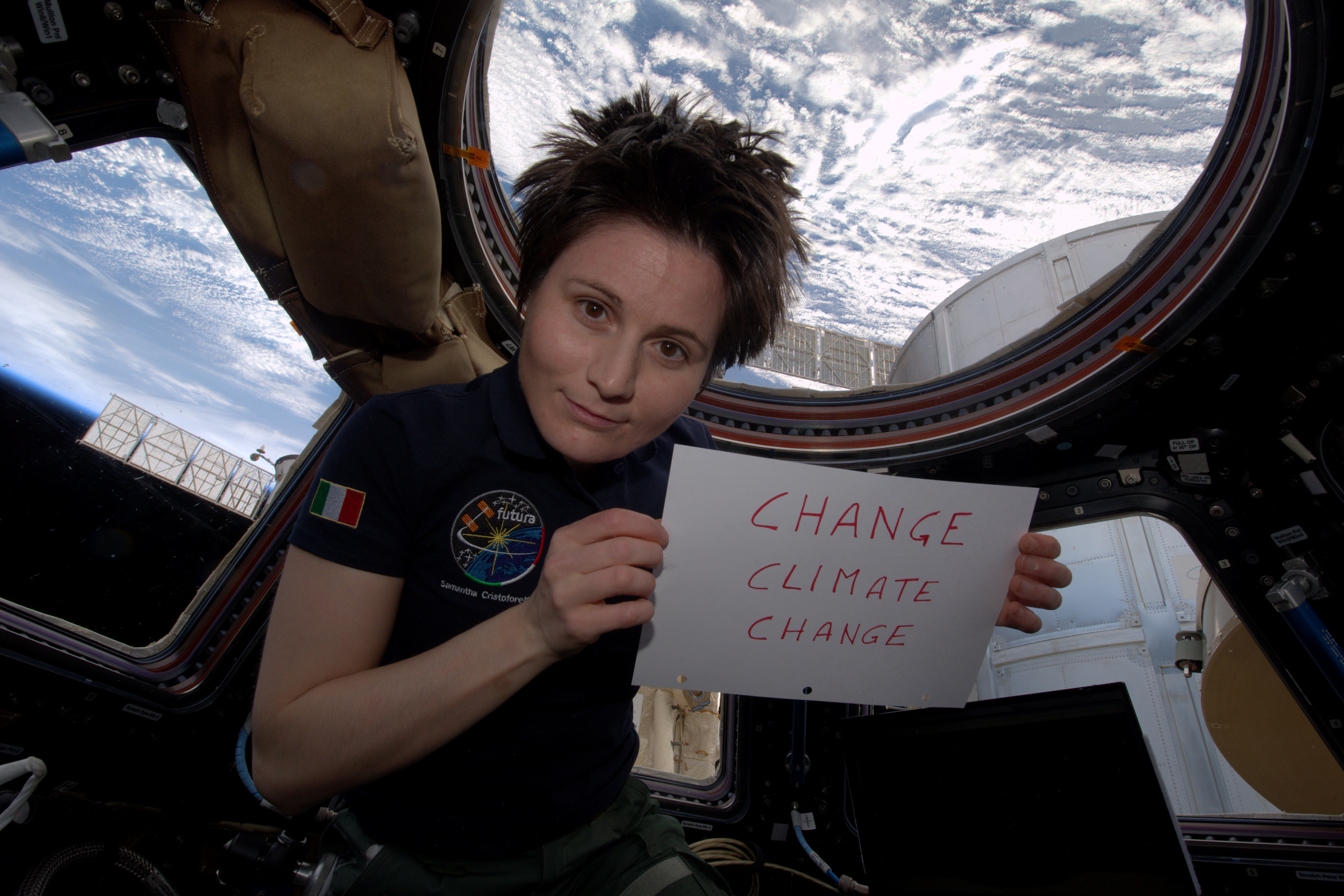 Change Climate Change sign in the ISS