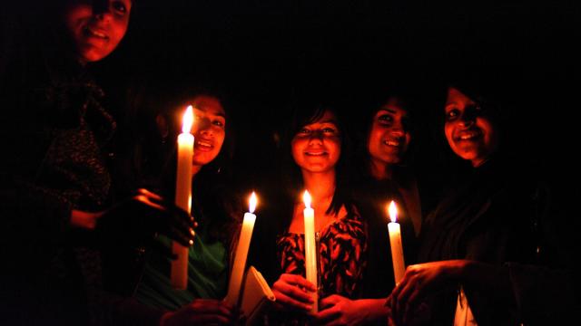 People holding candles
