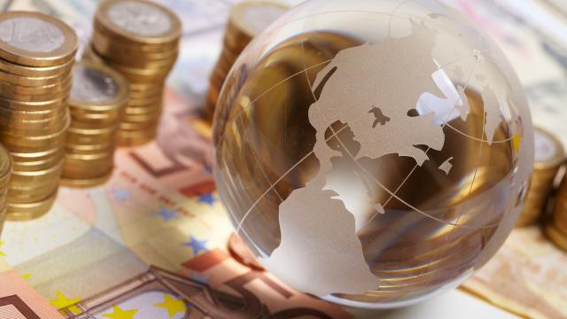 Currency and money on the table representing global investment and finance. 