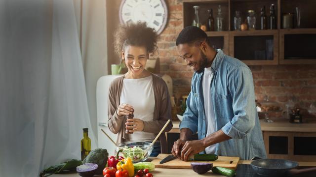 A couple making dinner