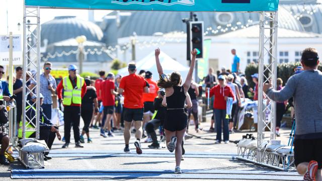 runner approaching the finish line at Worthing Runfest