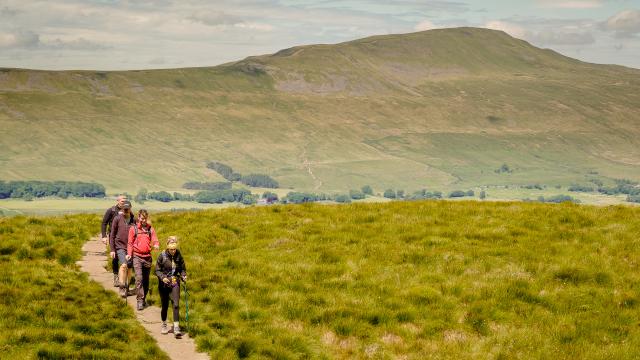 Hikers doing the Yorkshire Three Peaks challenge