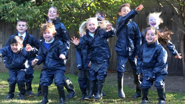 Pupils and staff, connect with nature in their forest school after unboxing waterproofs and wellies donated by WWF-UK in collaboration with The Outdoor Guide Foundation on Monday 29 September, 2025