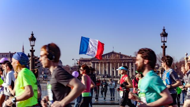running past french monument