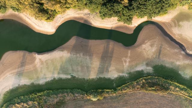 Aerial of reservoir low levels Derbyshire UK