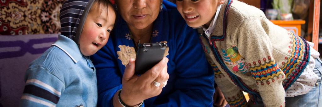 Nomadic herders using mobile phone