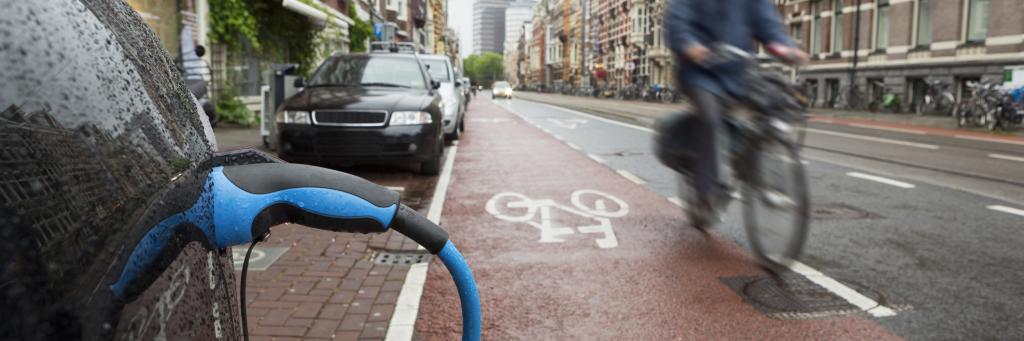 Electric vehicle charging and bicycle