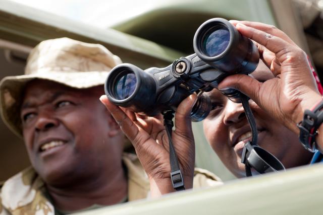 Rangers looking through binoculars