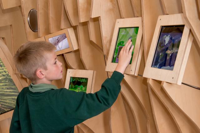 Pupil exploring the WWF Experience at the Living Planet Centre © Richard Stonehouse / WWF-UK