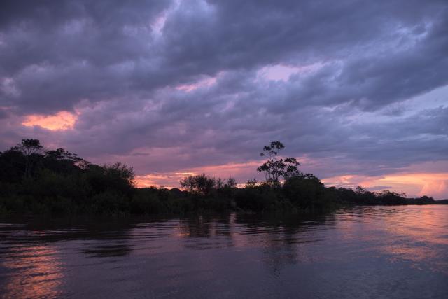 Sunset in forest and river landscapes near Puerto Nariño Amazonas, Colombia.