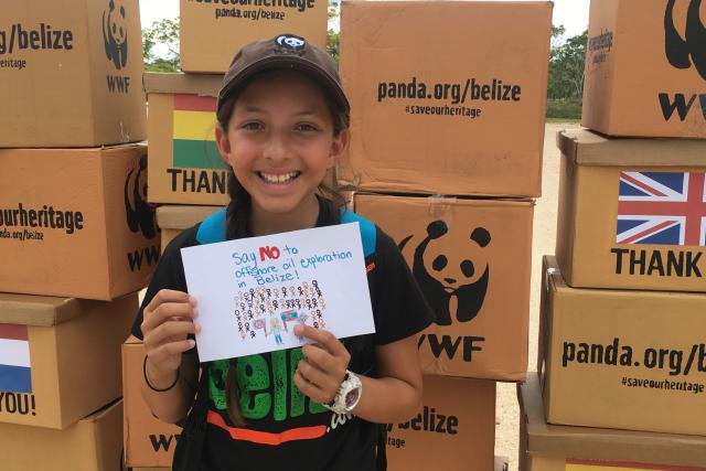 WWF supporter Madison handing in letters - © itravelbelize.com