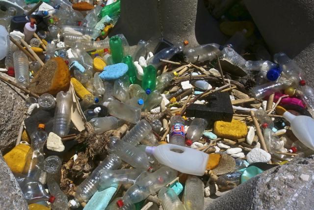 Pile of old plastic bottles and other trash