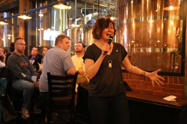 A lady hosting an event