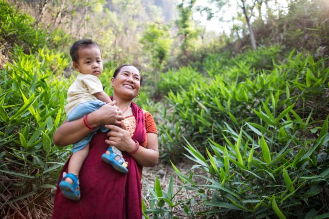 Portrait of Harigala Almathir and her son in the Abukhairani municipality ward n. 9, of Amdandabeshi, Nepal. 