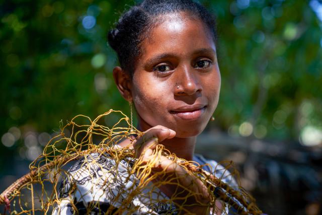 A fishing woman in a village set among mangroves in the western coastal region of Madagascar. 
