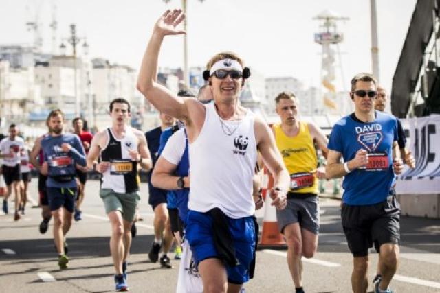A runner crossing the finish line
