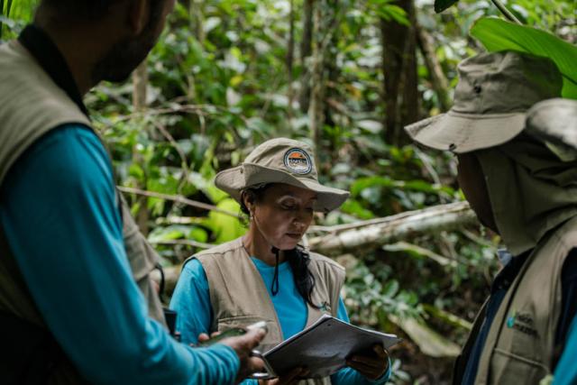 A group of local community leaders and 'environmental promoters' conduct an environmental survey of the forest on the farm of Marco Aurelio Zapata