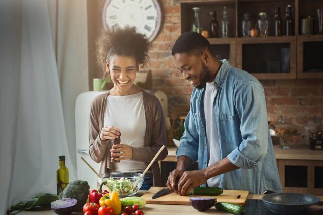 A couple making dinner