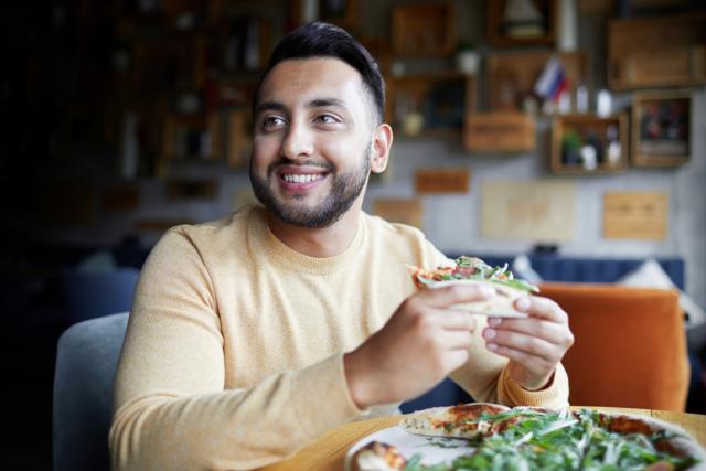 Man eating burger