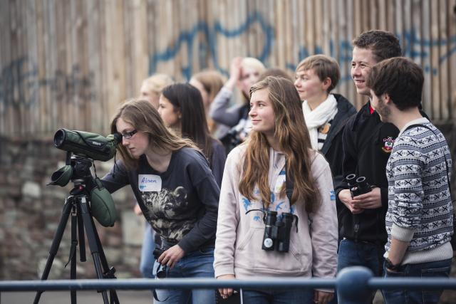 Young people behind a camera