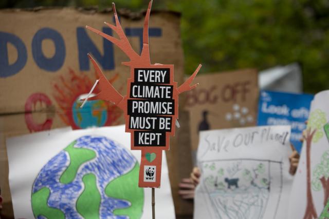 WWF supporters take part in the Global Day of Action for Climate Justice march through Glasgow during COP26