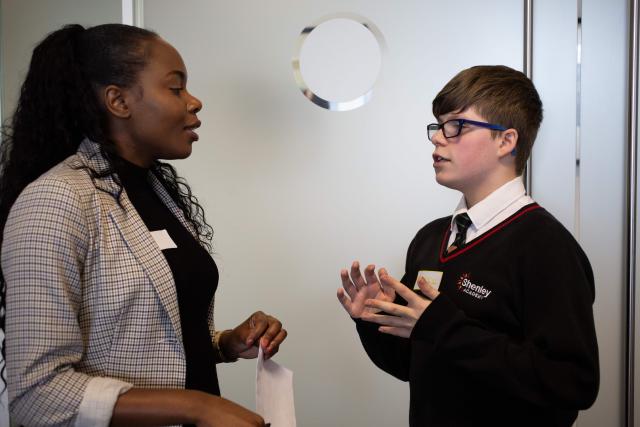 An employer talking to a student