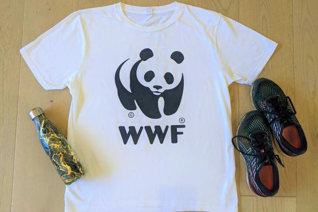WWF t-shirt flat-lay, with water bottle and trainers