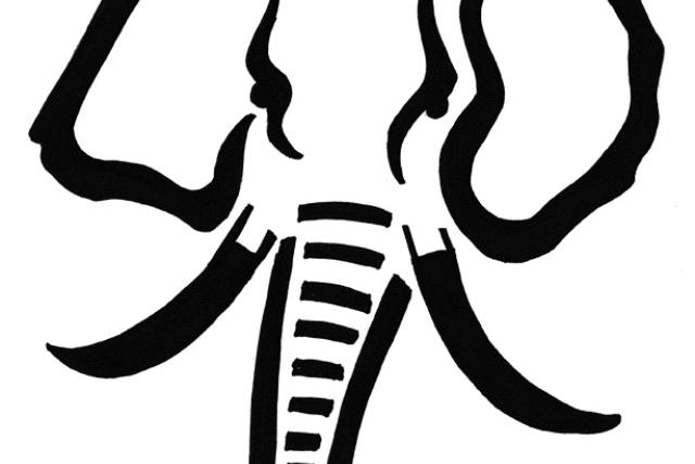 A black pumpkin stencil of an elephant