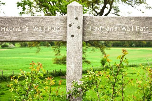 A signpost showing Hadrian's Wall Trail Path