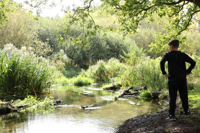 Families and children take part in an Aviva Access to Nature Fund visit along the River Nar, Norfolk.