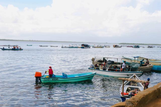 boats in the water at Lamu old town