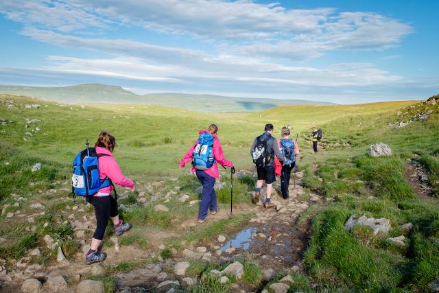Hikers doing the Yorkshire Three Peaks challenge