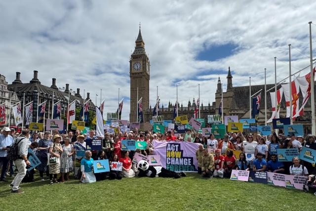 WWF supporters and climate campaigners in front Parliament as part of 2025 Mass Lobby
