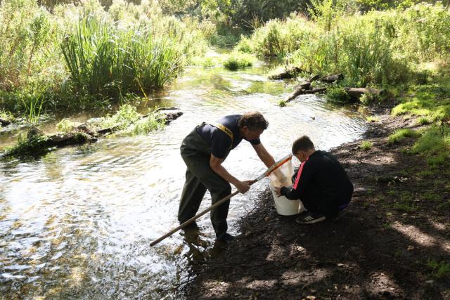 Families and children take part in an Aviva Access to Nature Fund visit along the River Nar, Norfolk.