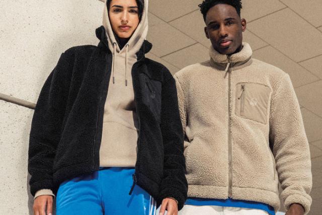 Two people wearing Recycled Unisex Sherpa Jacket