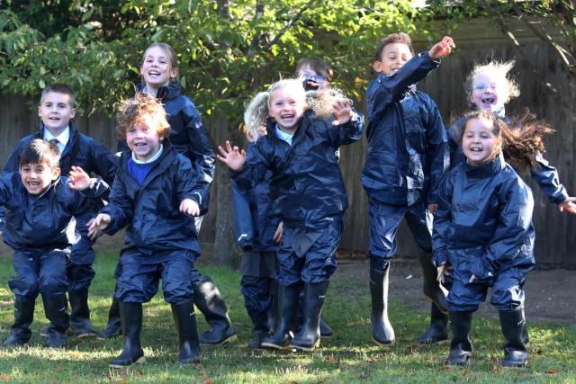 Pupils and staff, connect with nature in their forest school after unboxing waterproofs and wellies donated by WWF-UK in collaboration with The Outdoor Guide Foundation on Monday 29 September, 2025
