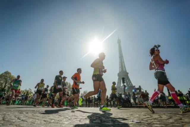 running past eiffel tower