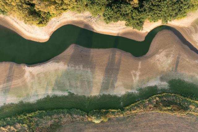 Aerial of reservoir low levels Derbyshire UK