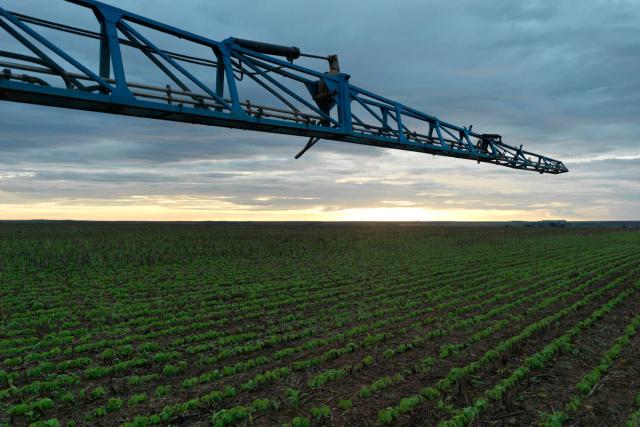 Agriculture machinery being used on a soy plantation Brazil 