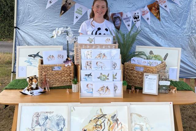 Young female in arts and craft stall